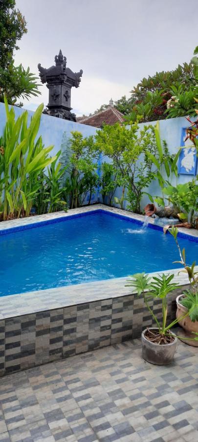 Turtle Island Homestay Санур Экстерьер фото